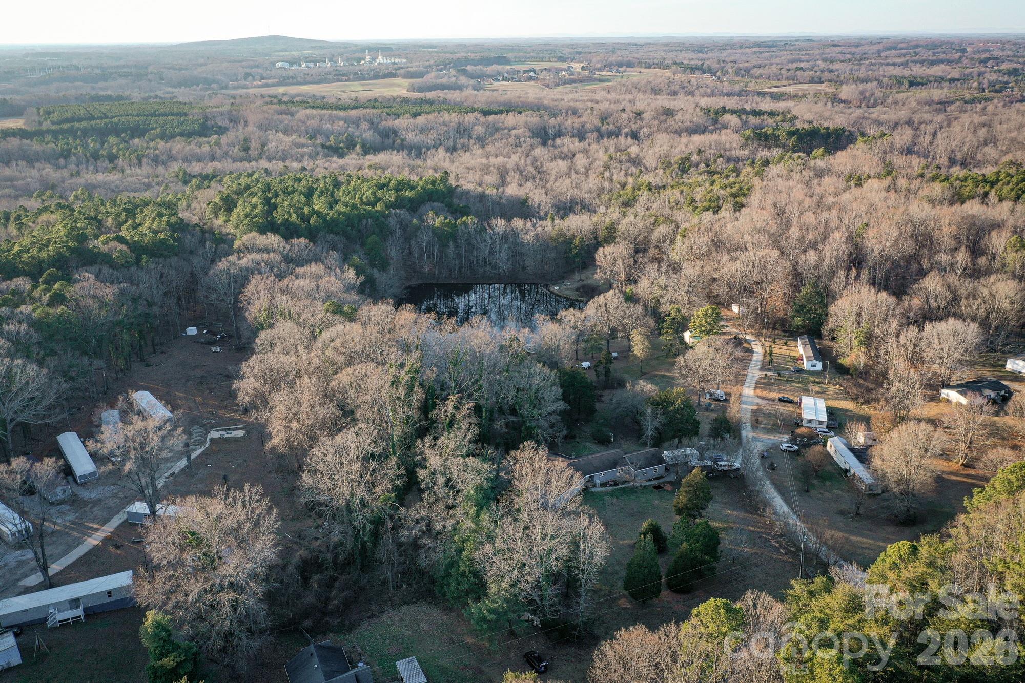 0 Kepley Road Salisbury, NC 28147 - Photo 18 of 18 an aerial view of house with yard and mountain view in back