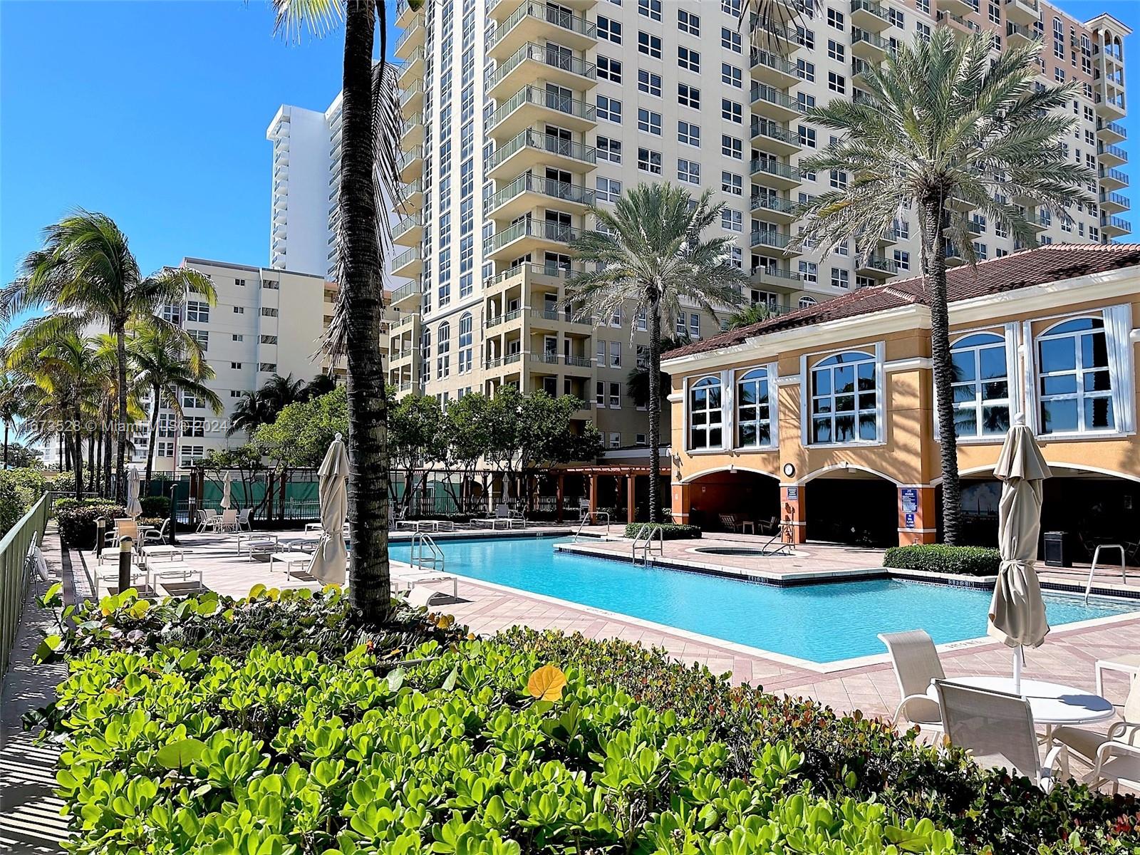 2080 South Ocean Drive, Unit 1602 Hallandale Beach, FL 33009 - Photo 26 of 38 a front view of a building with street view