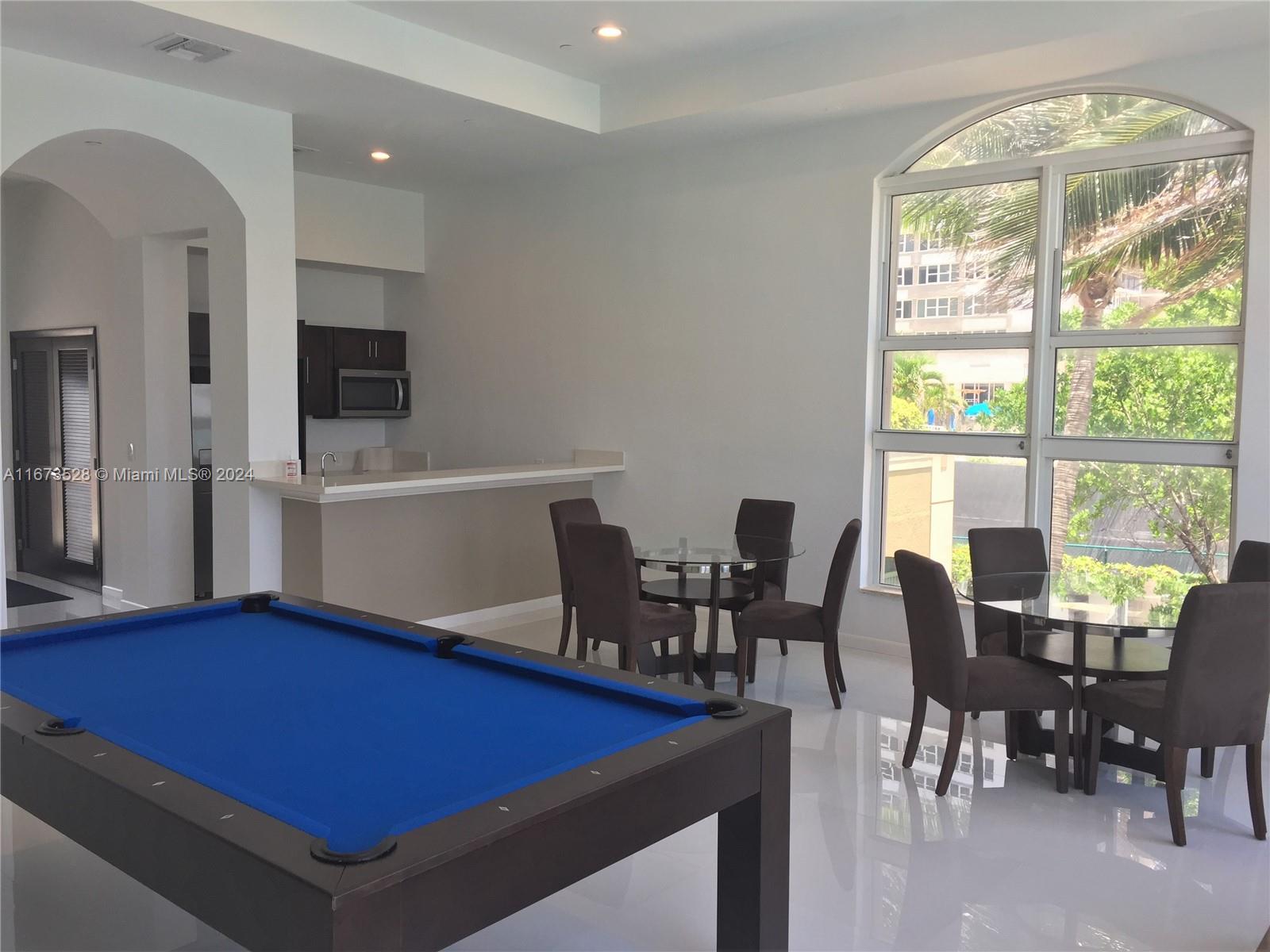 2080 South Ocean Drive, Unit 1602 Hallandale Beach, FL 33009 - Photo 37 of 38 a room with furniture pool table and windows