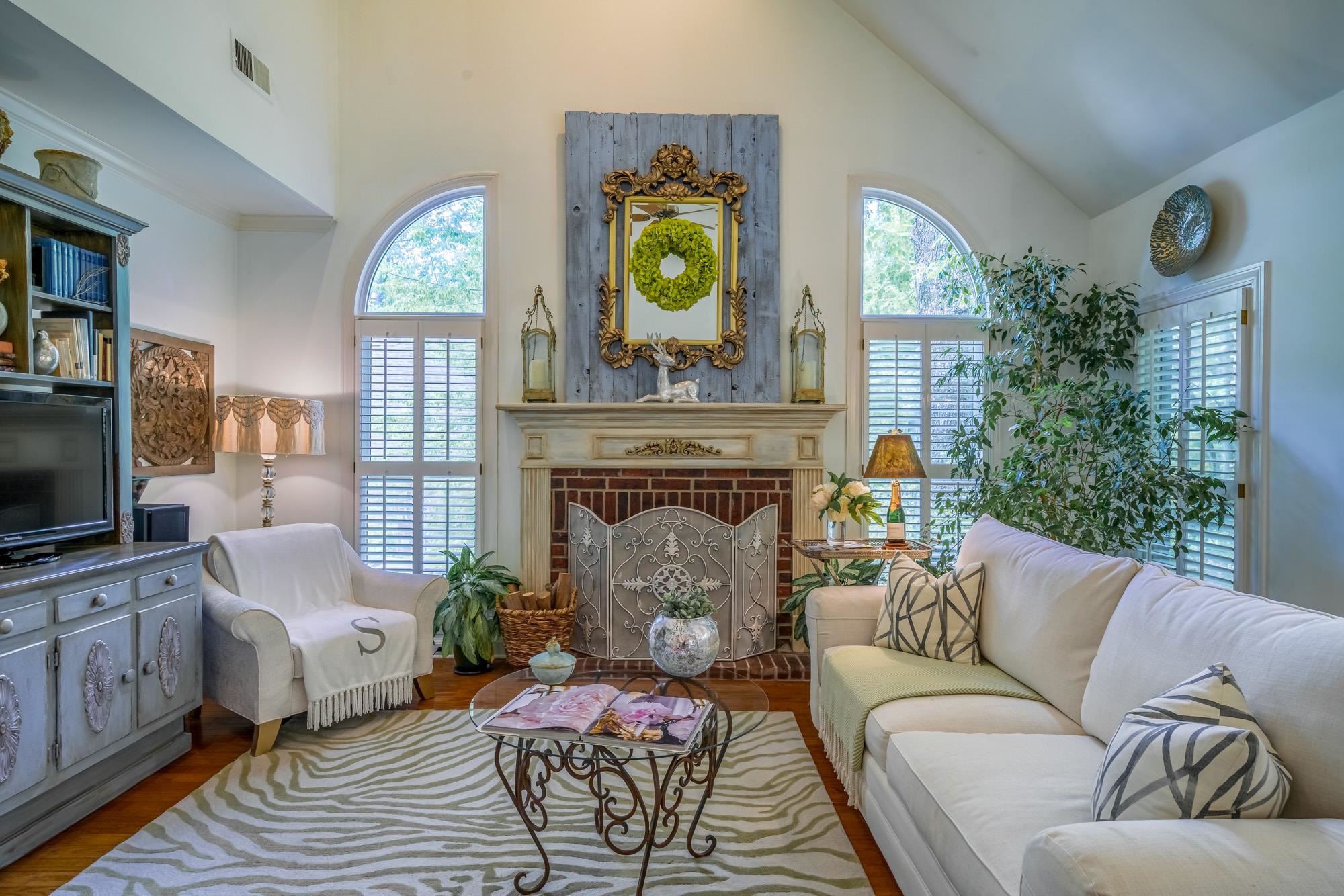 490 Brook Ridge Circle Memphis, TN 38018 - Photo 14 of 25 a living room with furniture a window and a fireplace