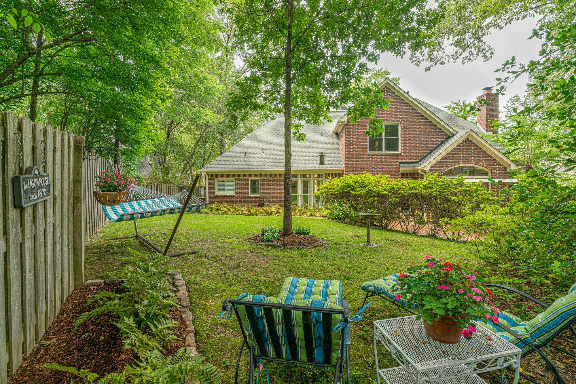 490 Brook Ridge Circle Memphis, TN 38018 - Photo 24 of 25 a view of house with backyard and sitting area