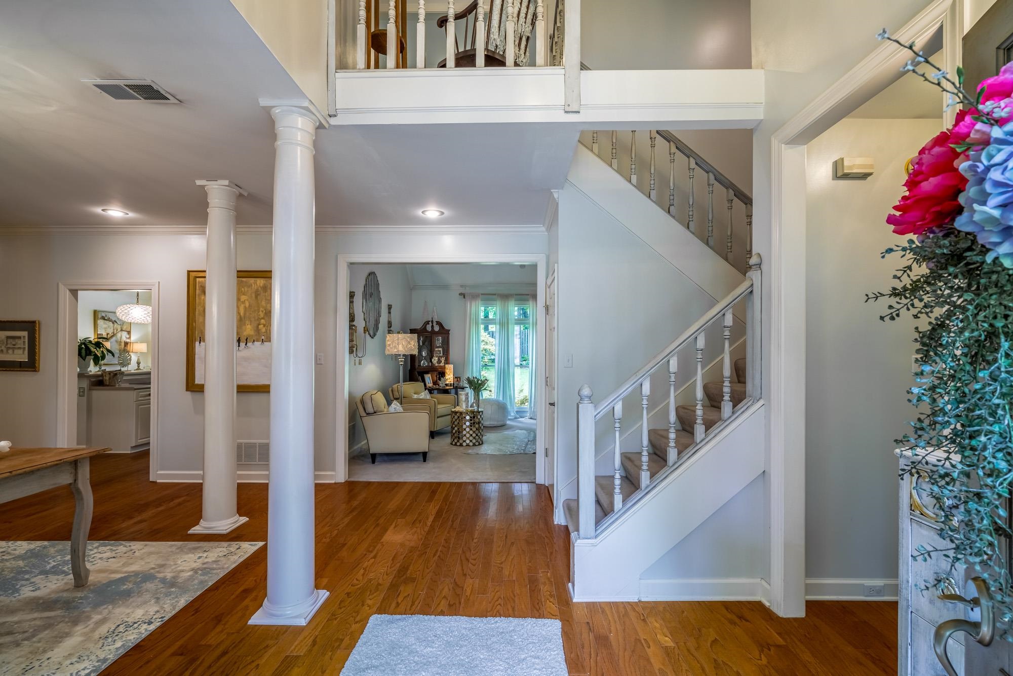 490 Brook Ridge Circle Memphis, TN 38018 - Photo 3 of 25 a view of an entryway with wooden floor and a livingroom view