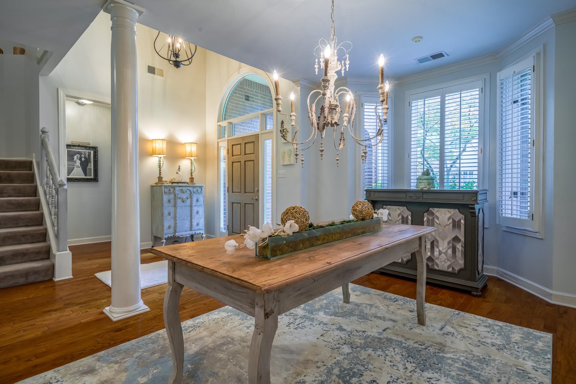 490 Brook Ridge Circle Memphis, TN 38018 - Photo 6 of 25 a view of a dining room with furniture and wooden floor