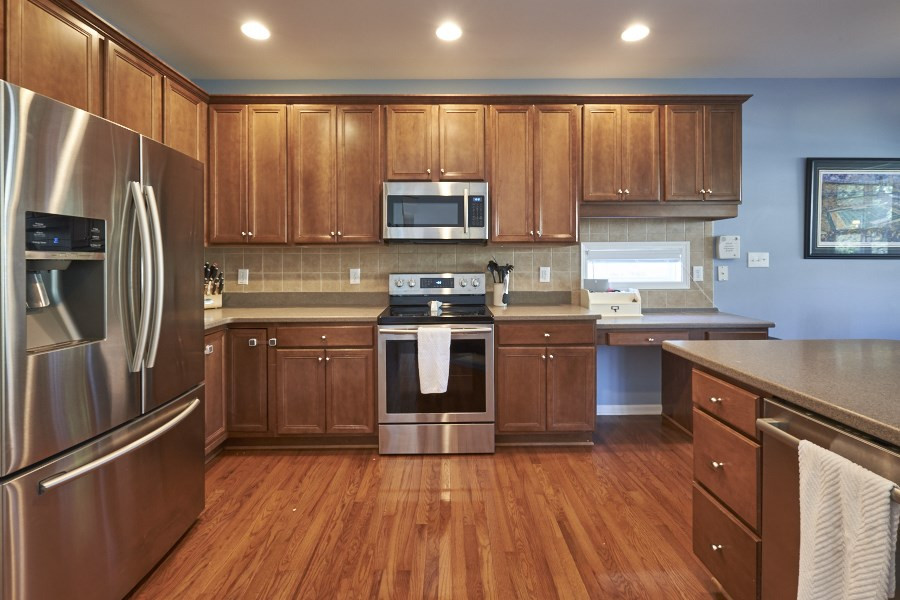 8518 Eden Park Drive Raleigh, NC 27613 - Photo 13 of 25 Stainless steel appliances and plenty of storage