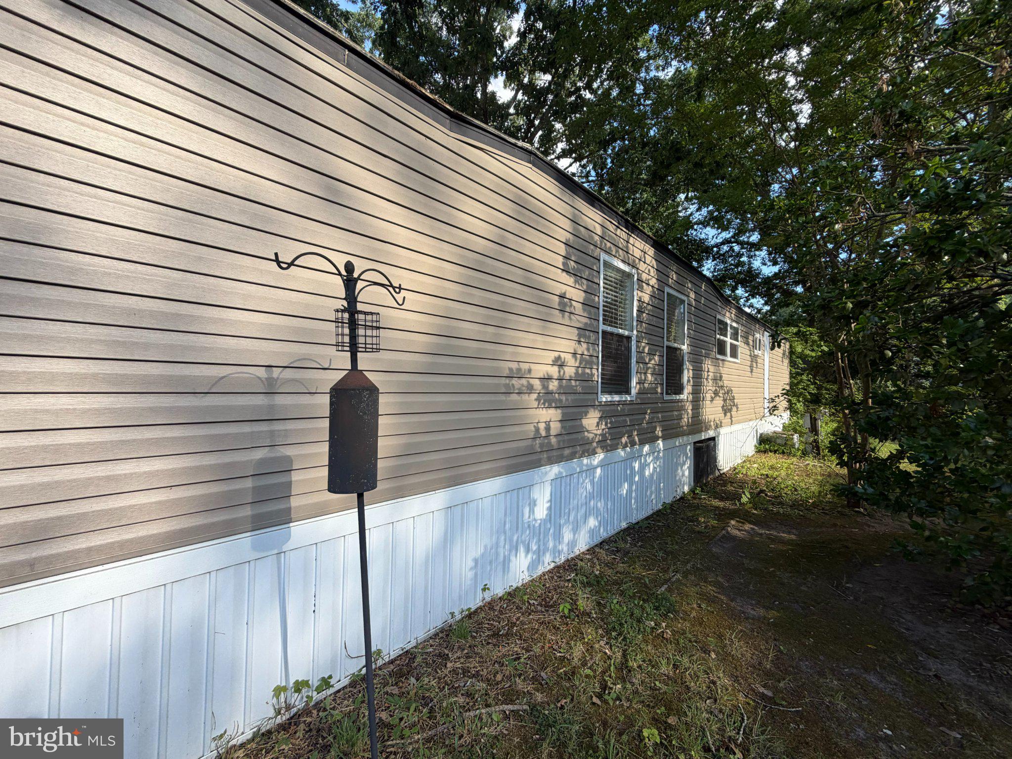 66 Roberts Road Toms River, NJ 08755 - Photo 11 of 13 Charming exterior with natural surroundings.
