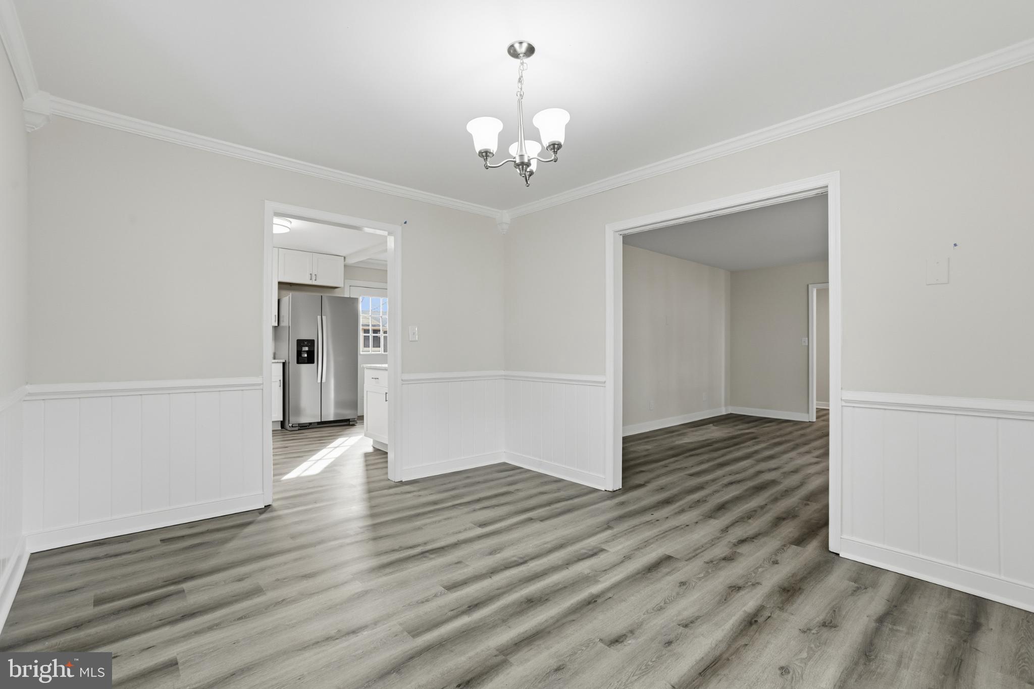 192 East Banbury Road Tappahannock, VA 22560 - Photo 17 of 50 wooden floor in an empty room with a window