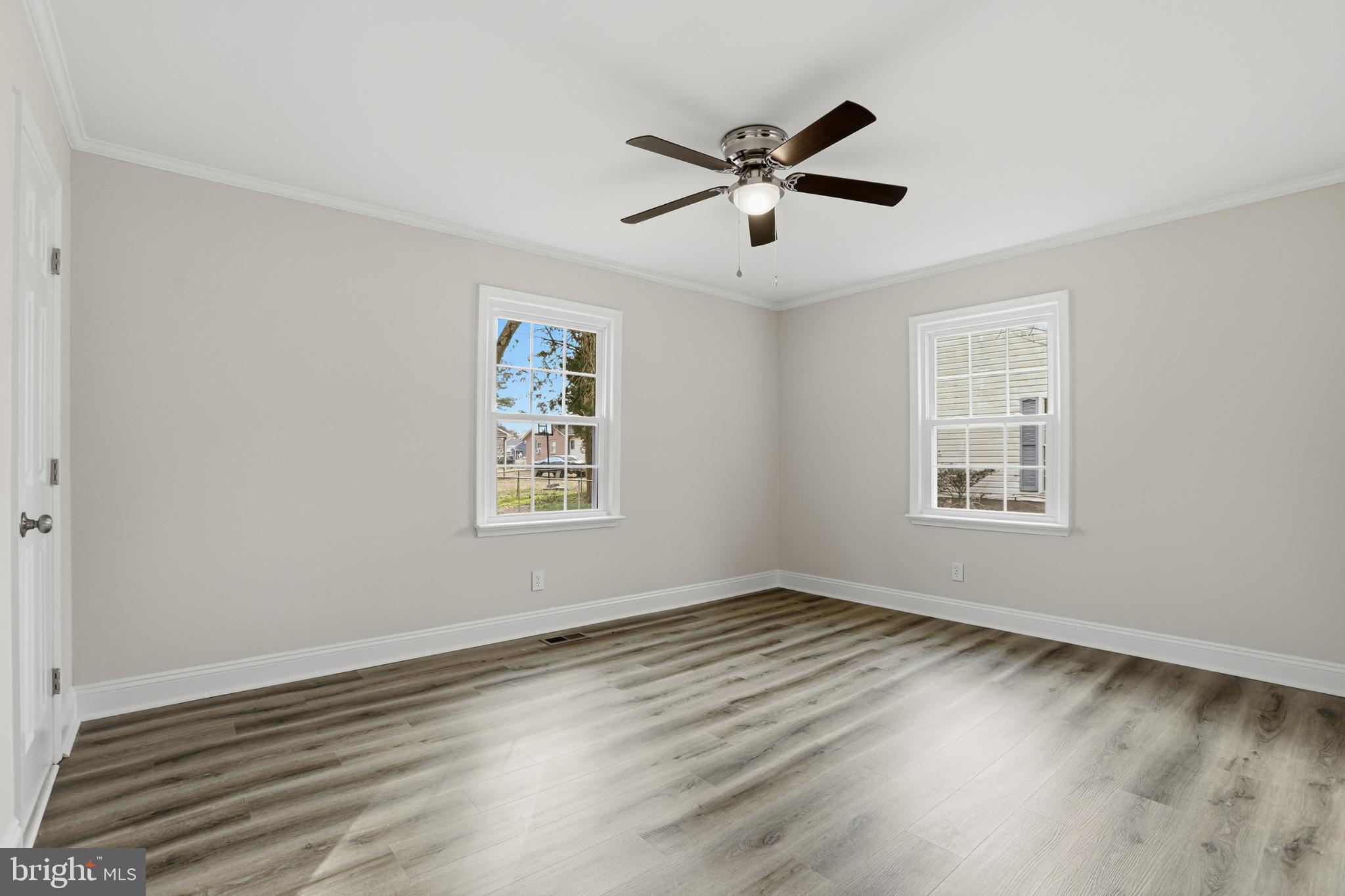 192 East Banbury Road Tappahannock, VA 22560 - Photo 27 of 50 a view of empty room with wooden floor and fan