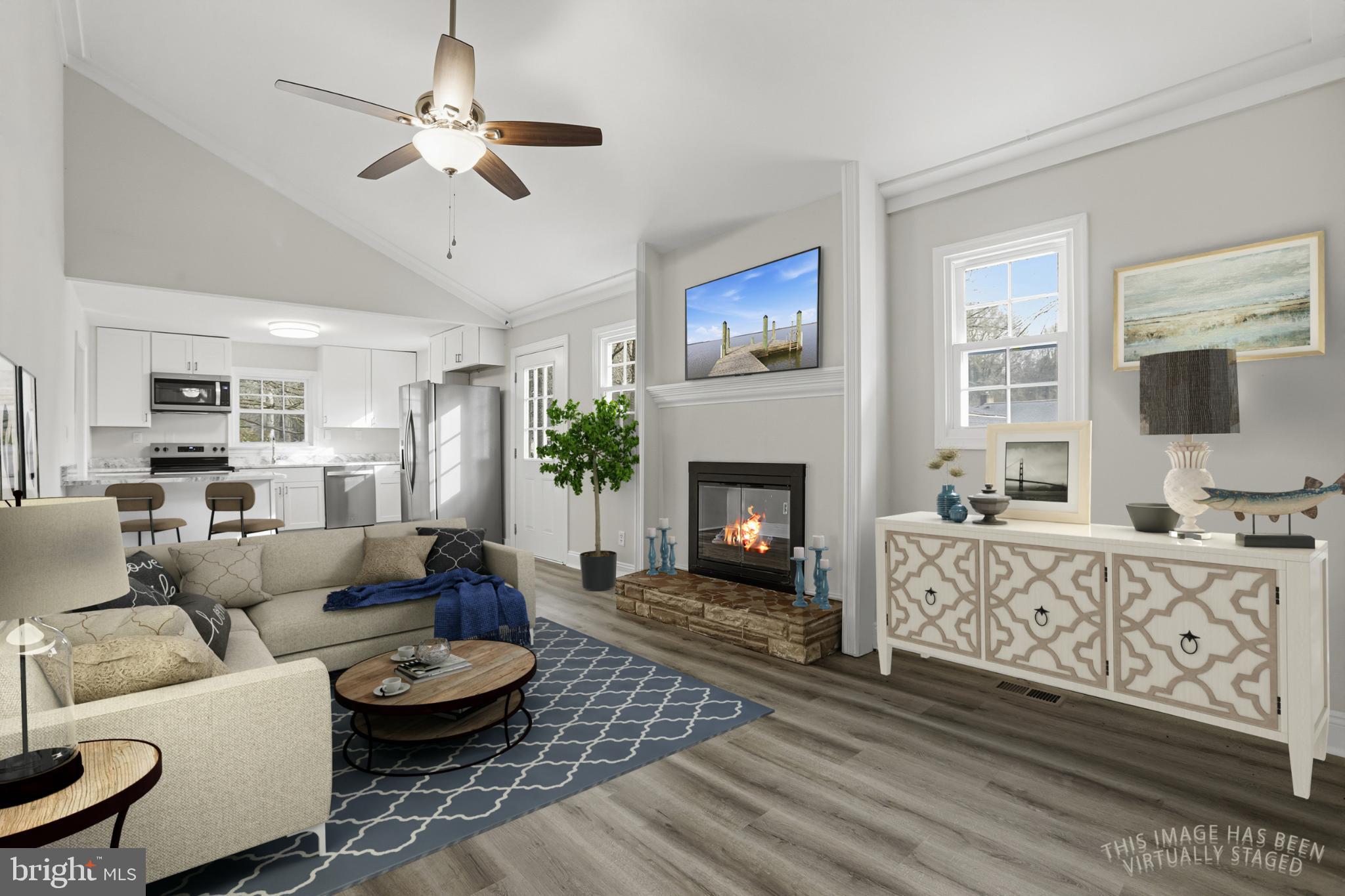 192 East Banbury Road Tappahannock, VA 22560 - Photo 3 of 50 a living room with furniture fireplace and a flat screen tv