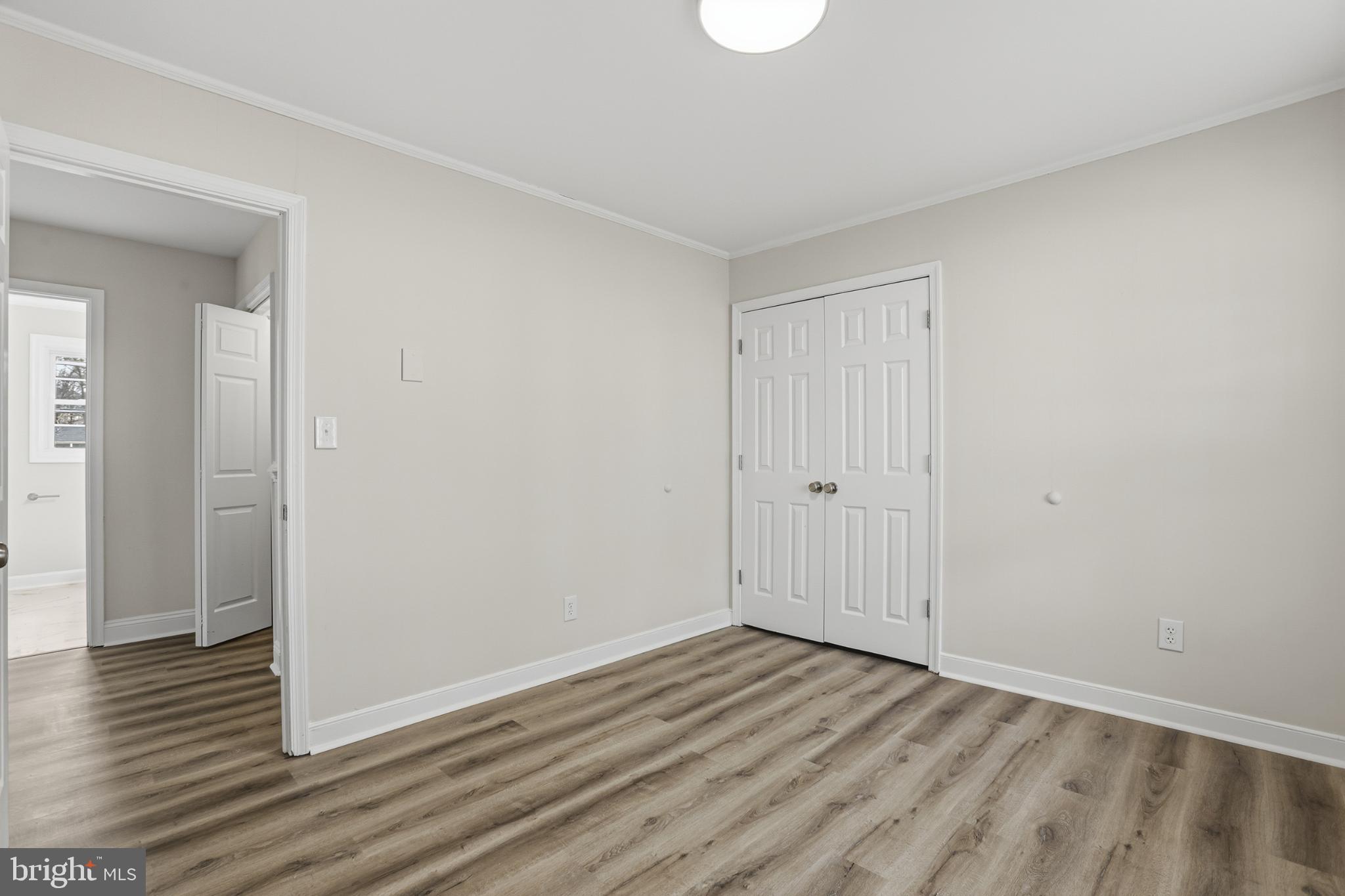 192 East Banbury Road Tappahannock, VA 22560 - Photo 32 of 50 a view of an empty room with wooden floor