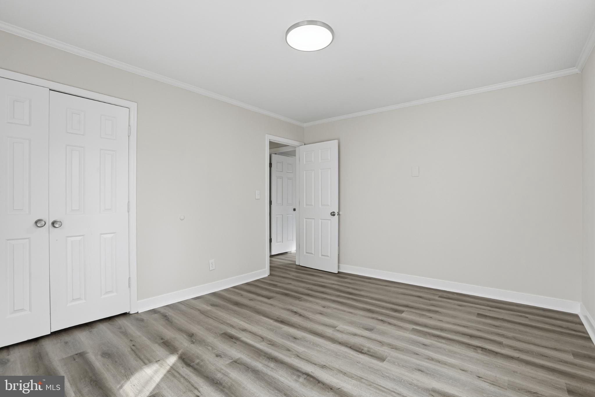 192 East Banbury Road Tappahannock, VA 22560 - Photo 35 of 50 a view of an empty room with wooden floor