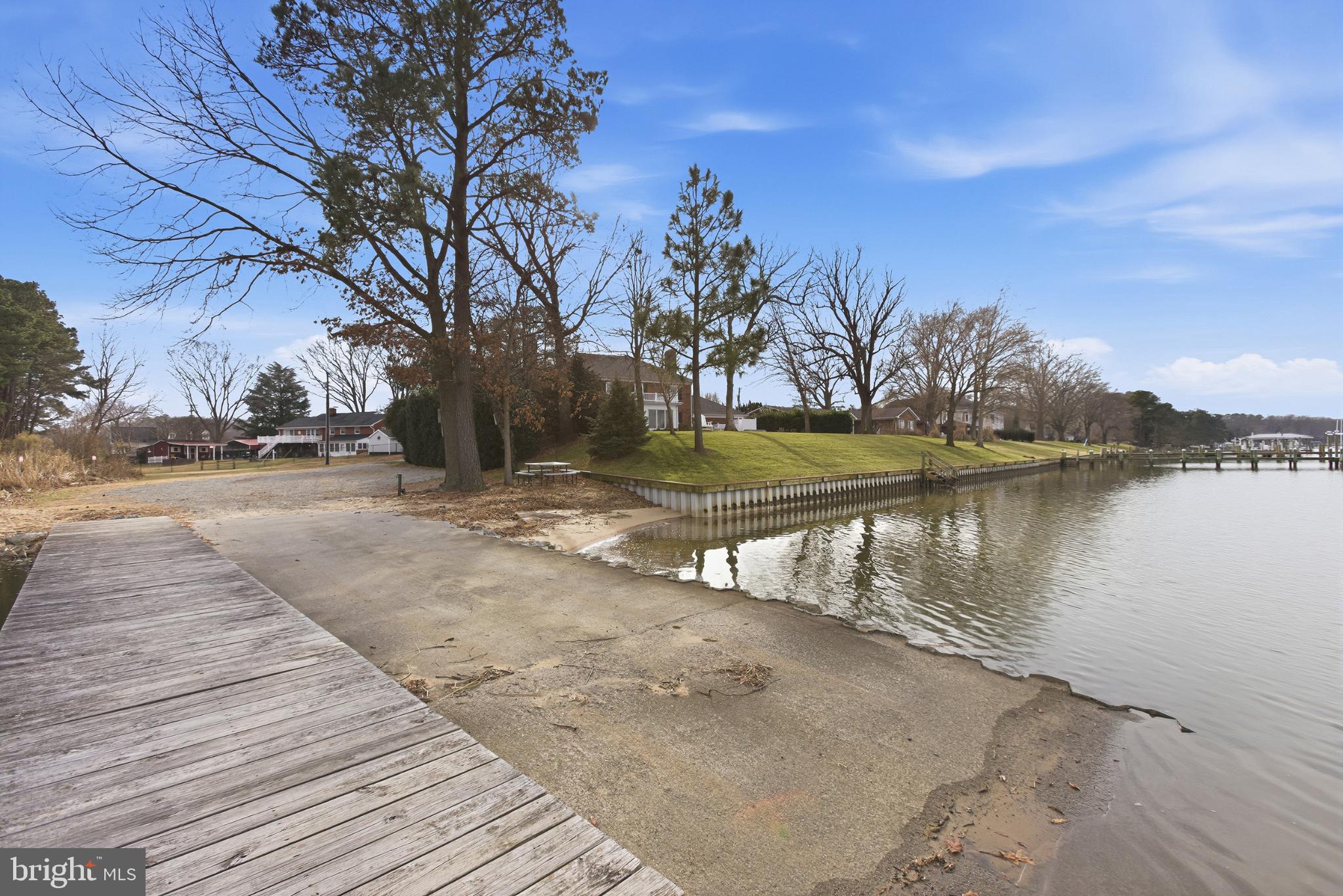 192 East Banbury Road Tappahannock, VA 22560 - Photo 49 of 50 a view of a yard next to a lake