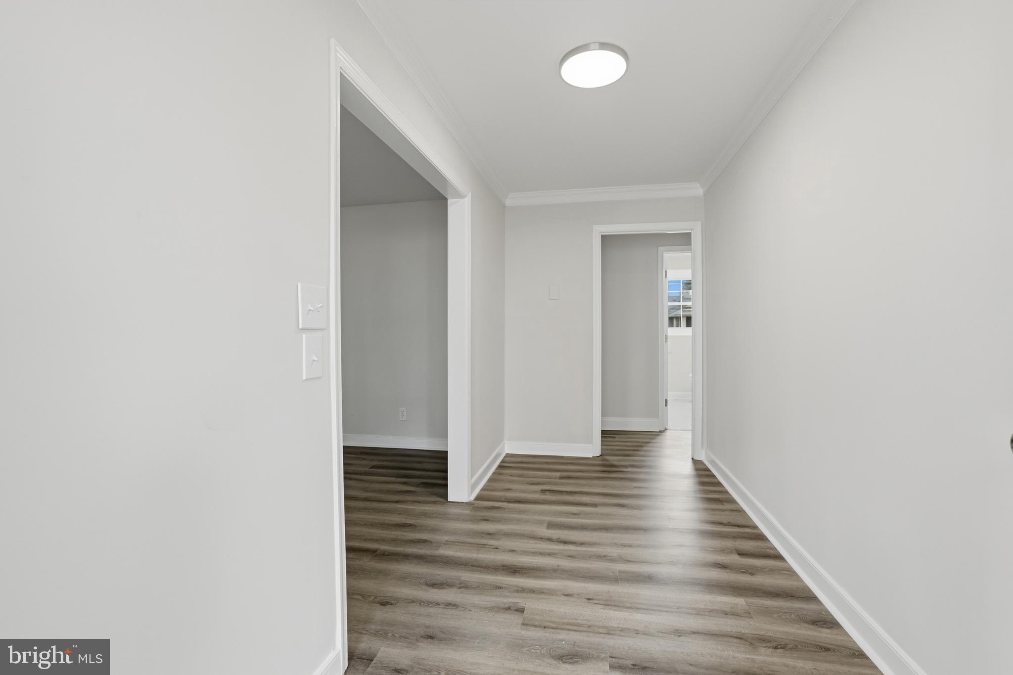 192 East Banbury Road Tappahannock, VA 22560 - Photo 10 of 50 a view of a hallway with wooden floor