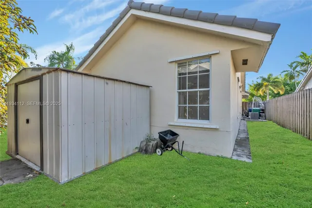 a house with garden in front of it
