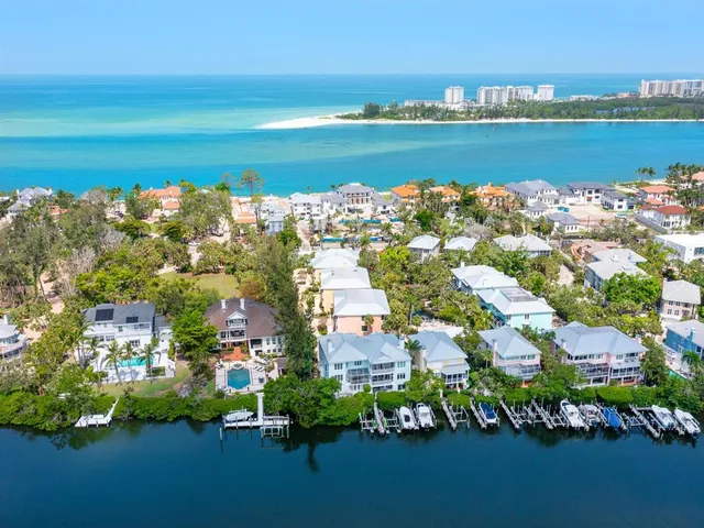 a view of a house with outdoor space and sitting area
