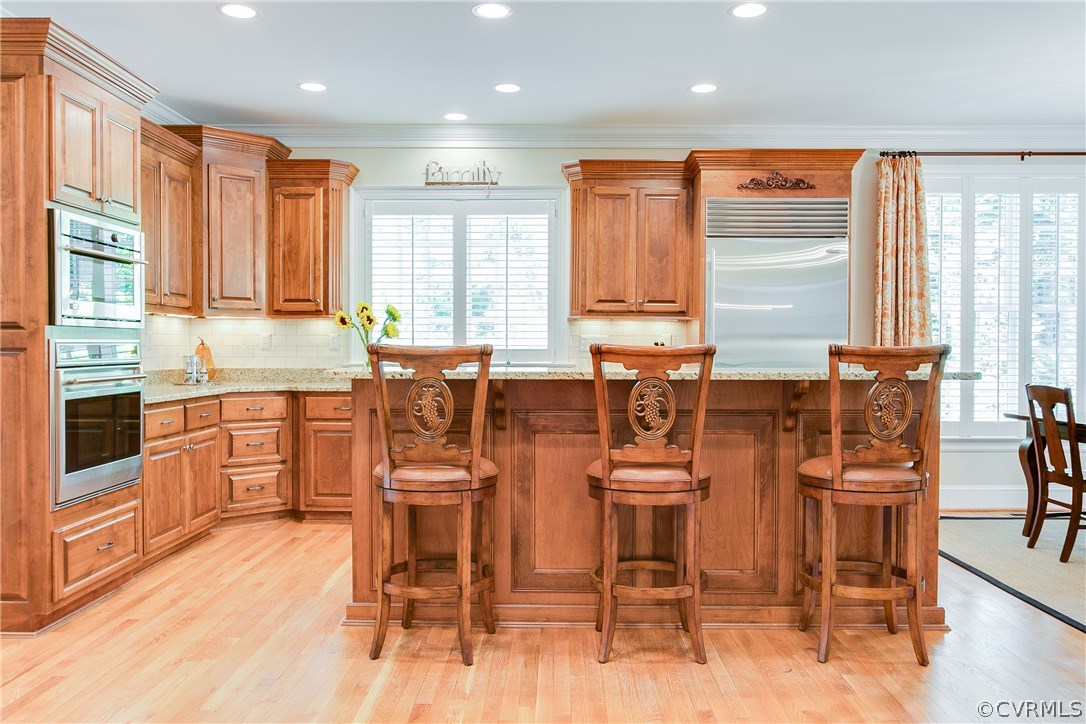 3660 Lansdowne Road Midlothian, VA 23113 - Photo 17 of 50 a large kitchen with a table and chairs