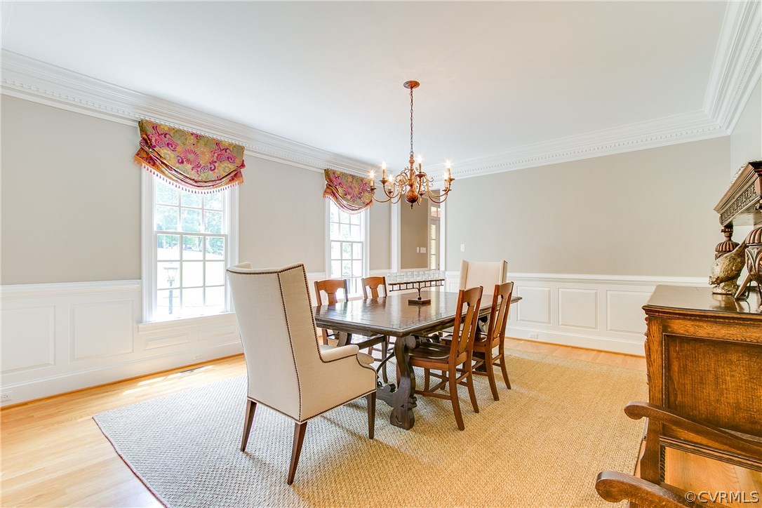 3660 Lansdowne Road Midlothian, VA 23113 - Photo 20 of 50 a view of a dining room with furniture window and wooden floor