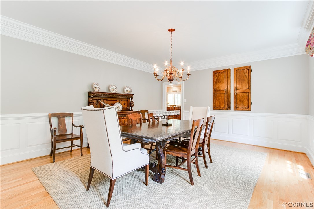 3660 Lansdowne Road Midlothian, VA 23113 - Photo 21 of 50 a view of a dining room with furniture and wooden floor