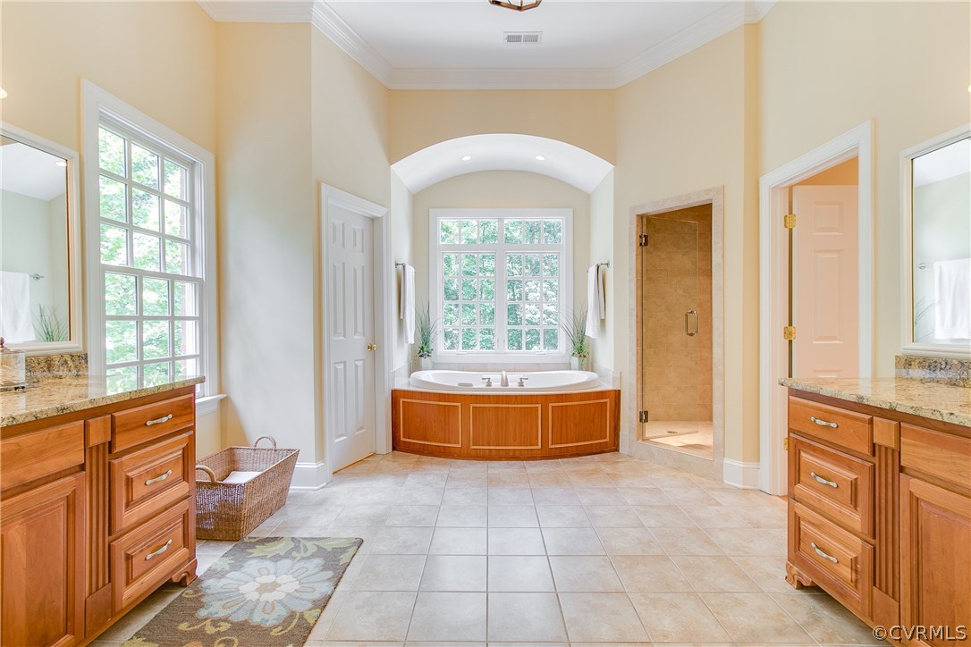 3660 Lansdowne Road Midlothian, VA 23113 - Photo 27 of 50 a spacious bathroom with a tub sink and mirror
