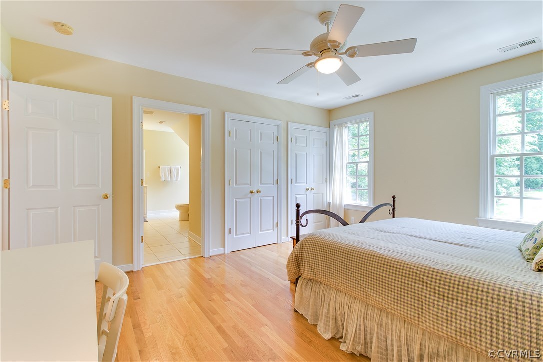 3660 Lansdowne Road Midlothian, VA 23113 - Photo 34 of 50 a bedroom with a bed and a chandelier