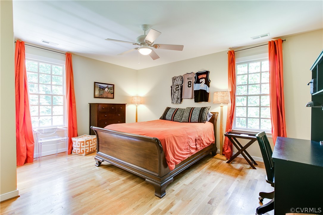 3660 Lansdowne Road Midlothian, VA 23113 - Photo 35 of 50 a bedroom with a bed and wooden floor
