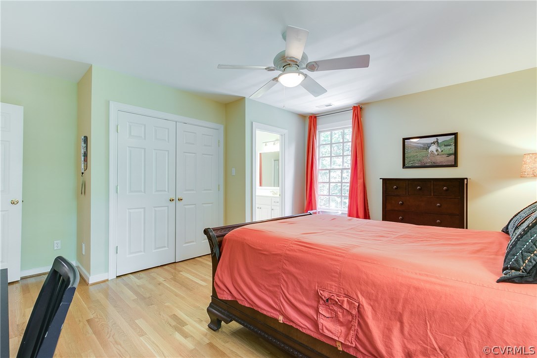 3660 Lansdowne Road Midlothian, VA 23113 - Photo 36 of 50 a bedroom with a bed and a chandelier