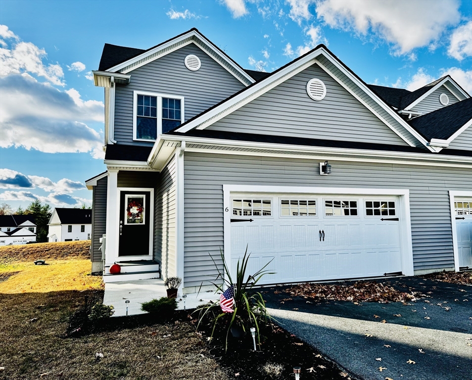 6 Nautical Way, Unit 122 Douglas, MA 01516 - Photo 1 of 42 a view of a house with a yard