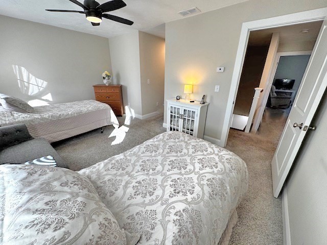 6 Nautical Way, Unit 122 Douglas, MA 01516 - Photo 22 of 42 a bedroom with a bed and a chair with the wooden floor