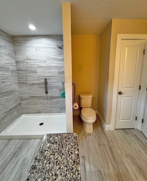 6 Nautical Way, Unit 122 Douglas, MA 01516 - Photo 26 of 42 a bathroom with a toilet and a shower