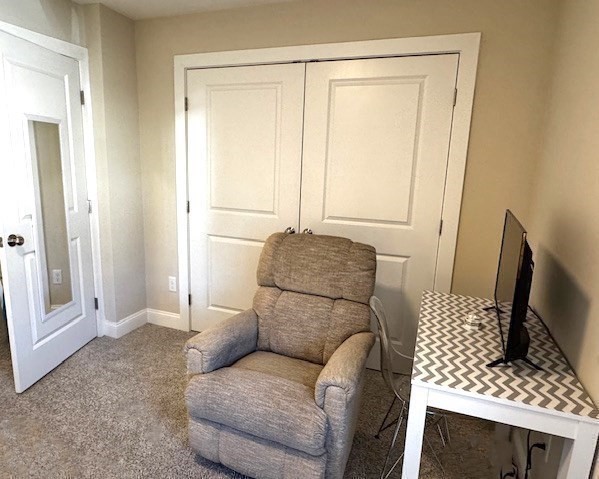 6 Nautical Way, Unit 122 Douglas, MA 01516 - Photo 28 of 42 a living room with furniture and a window