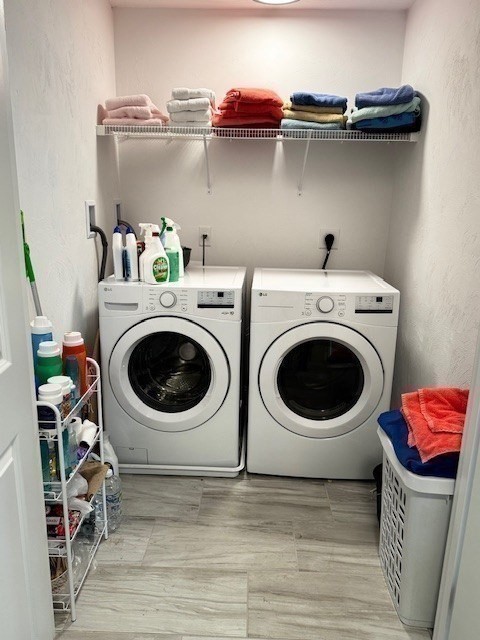 6 Nautical Way, Unit 122 Douglas, MA 01516 - Photo 34 of 42 a utility room with dryer and washer