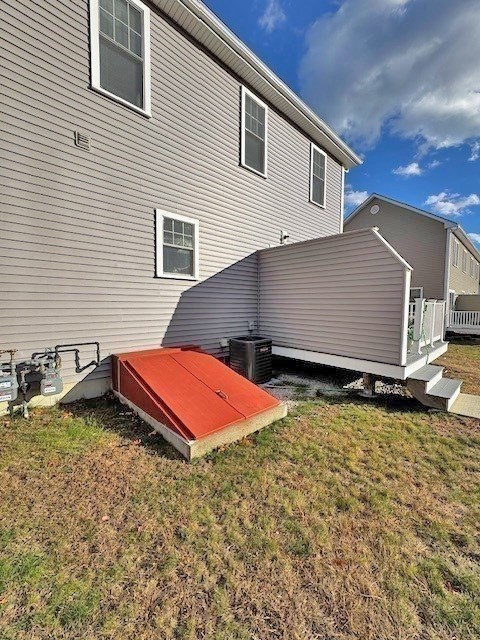 6 Nautical Way, Unit 122 Douglas, MA 01516 - Photo 40 of 42 a backyard of a house with yard and outdoor seating
