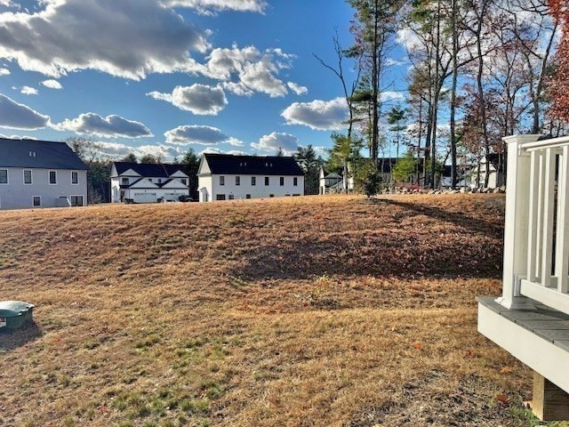 6 Nautical Way, Unit 122 Douglas, MA 01516 - Photo 41 of 42 a view of a house with a yard