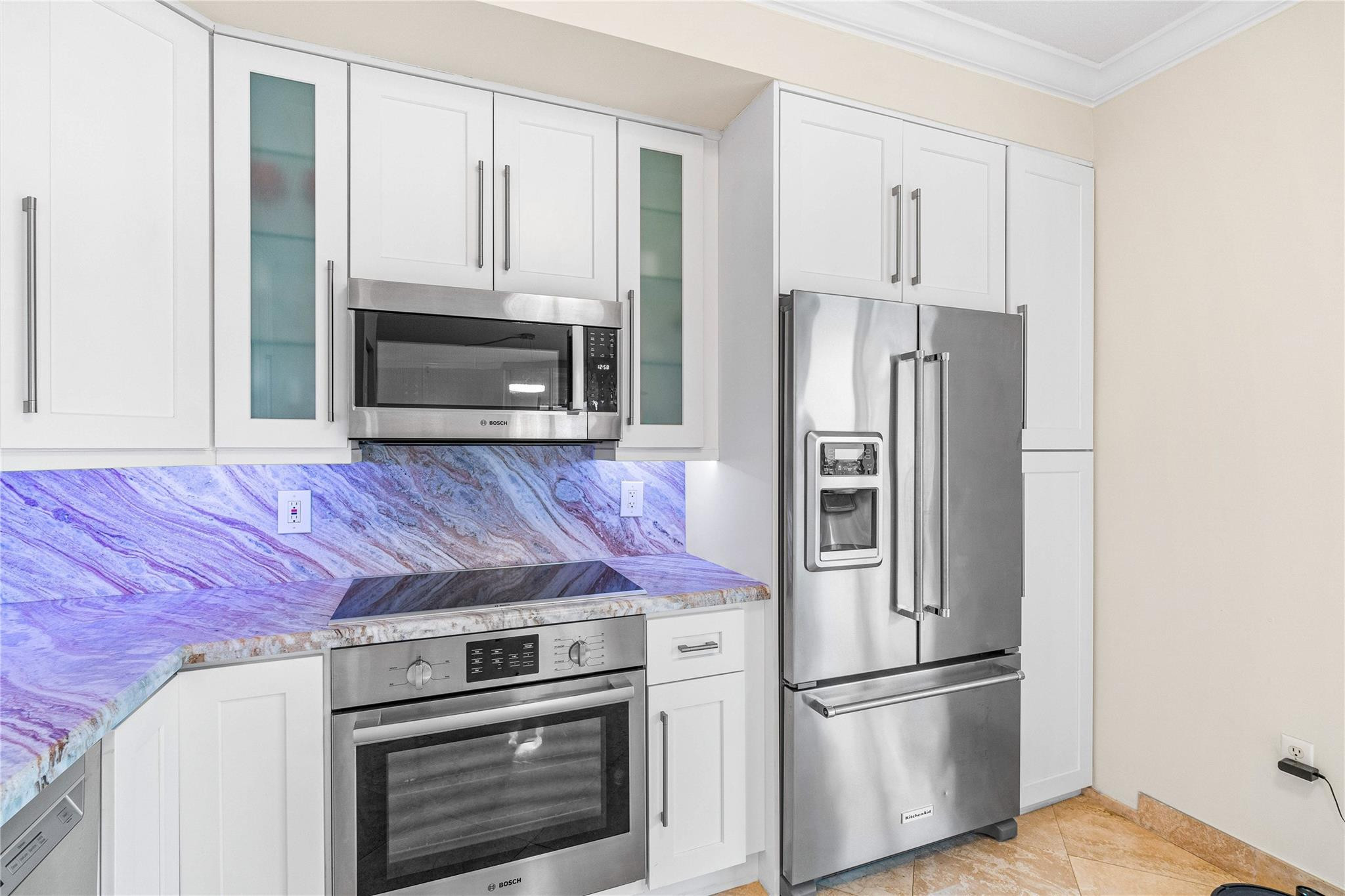 100 South Birch Road, Unit 904 Fort Lauderdale, FL 33316 - Photo 17 of 51 a kitchen with a refrigerator stove and microwave
