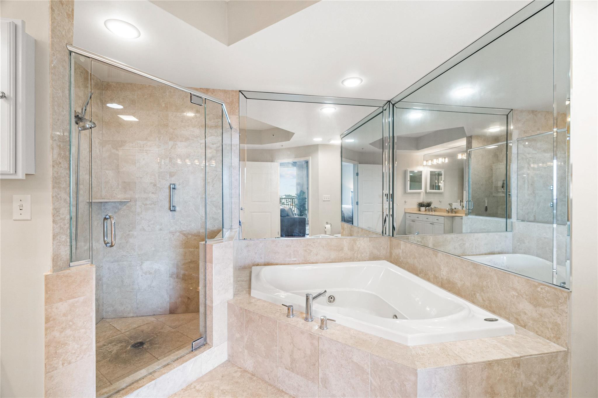 100 South Birch Road, Unit 904 Fort Lauderdale, FL 33316 - Photo 22 of 51 a bathroom with a tub shower vanity and sink