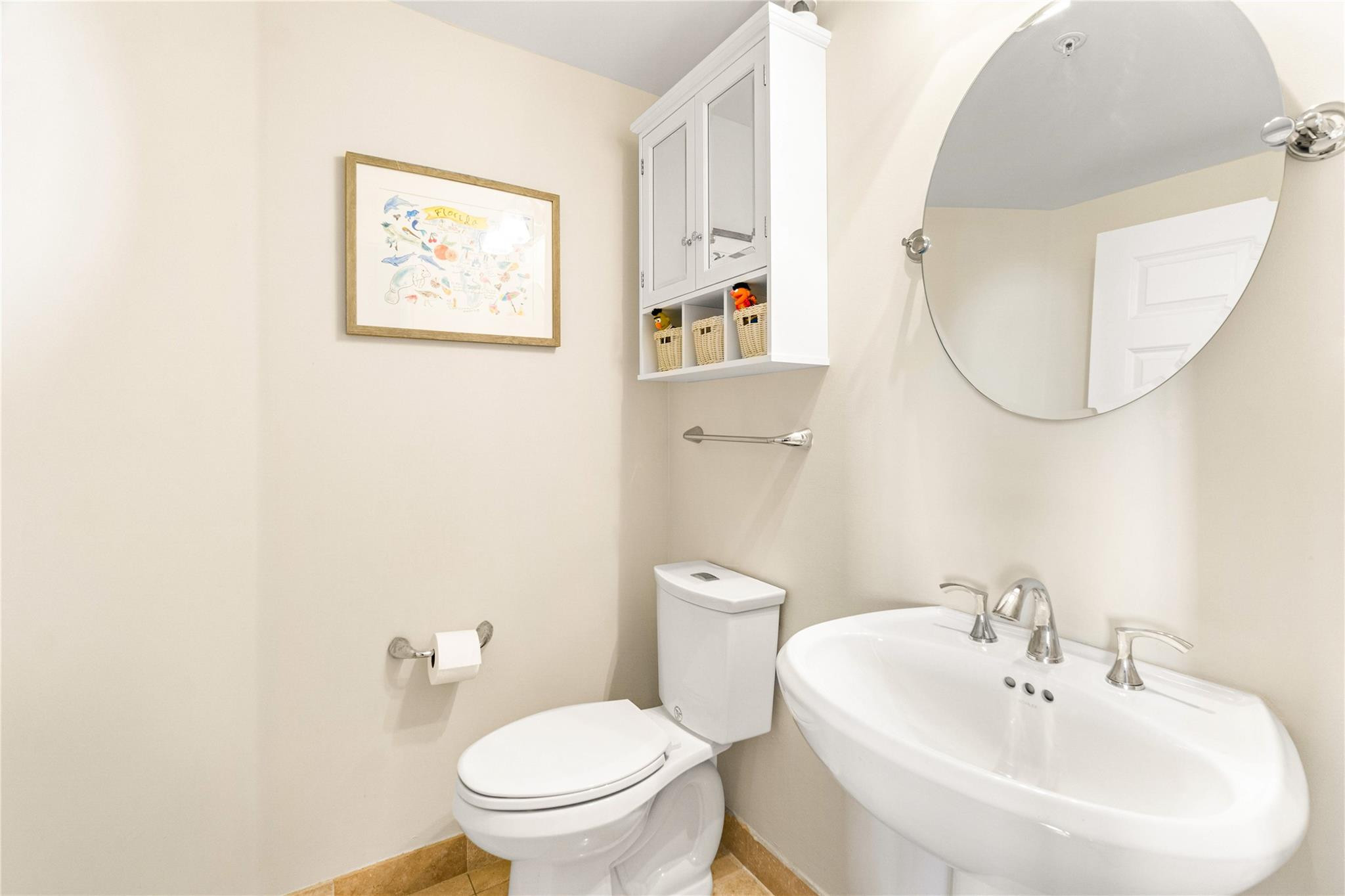 100 South Birch Road, Unit 904 Fort Lauderdale, FL 33316 - Photo 25 of 51 a bathroom with a toilet and a sink