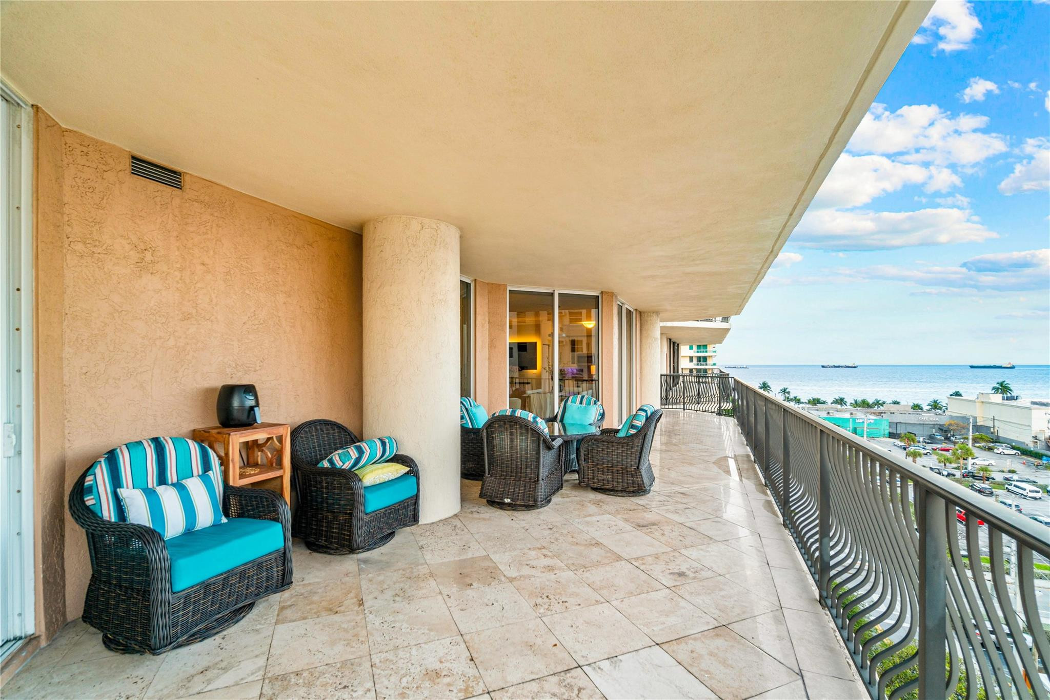 100 South Birch Road, Unit 904 Fort Lauderdale, FL 33316 - Photo 32 of 51 a view of a patio with couches chairs and potted plants