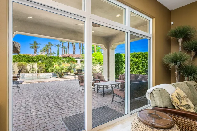 a view of a swimming pool with a lounge chairs