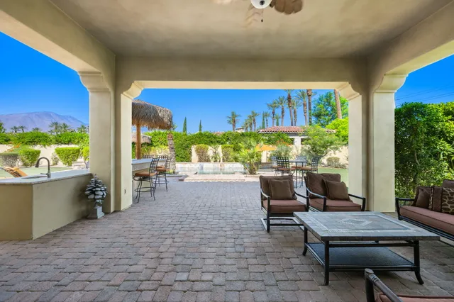 a view of a swimming pool with a patio
