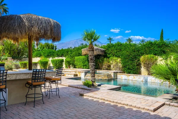 a bed room with a bed and a television