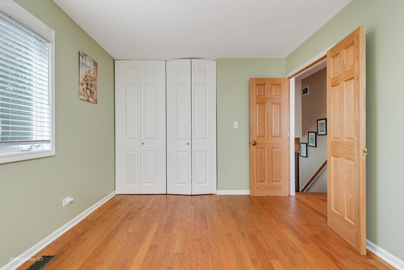 532 Inverrary Lane Deerfield, IL 60015 - Photo 12 of 23 a view of a hallway with wooden floor and staircase