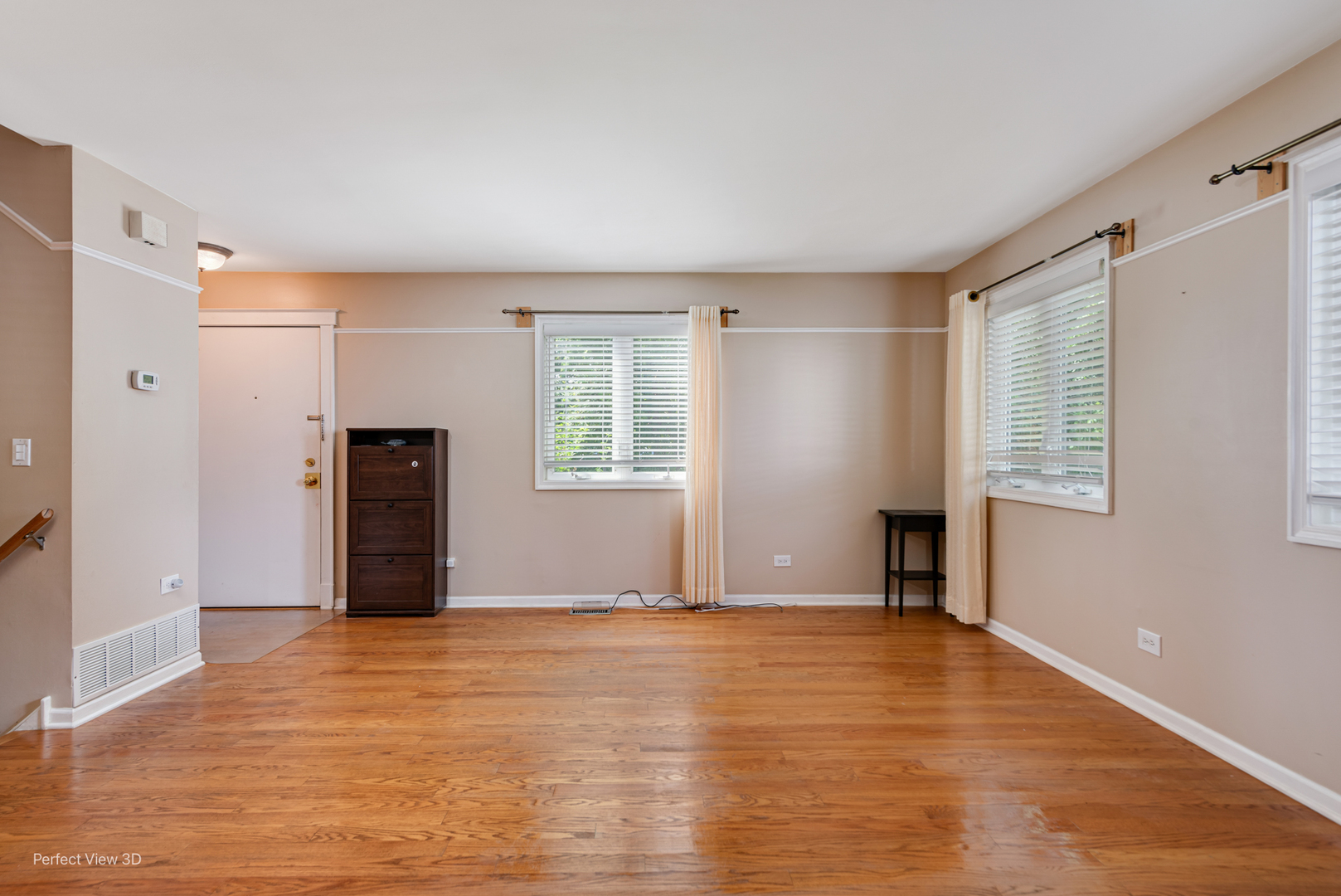 532 Inverrary Lane Deerfield, IL 60015 - Photo 3 of 23 a view of an empty room with window and wooden floor