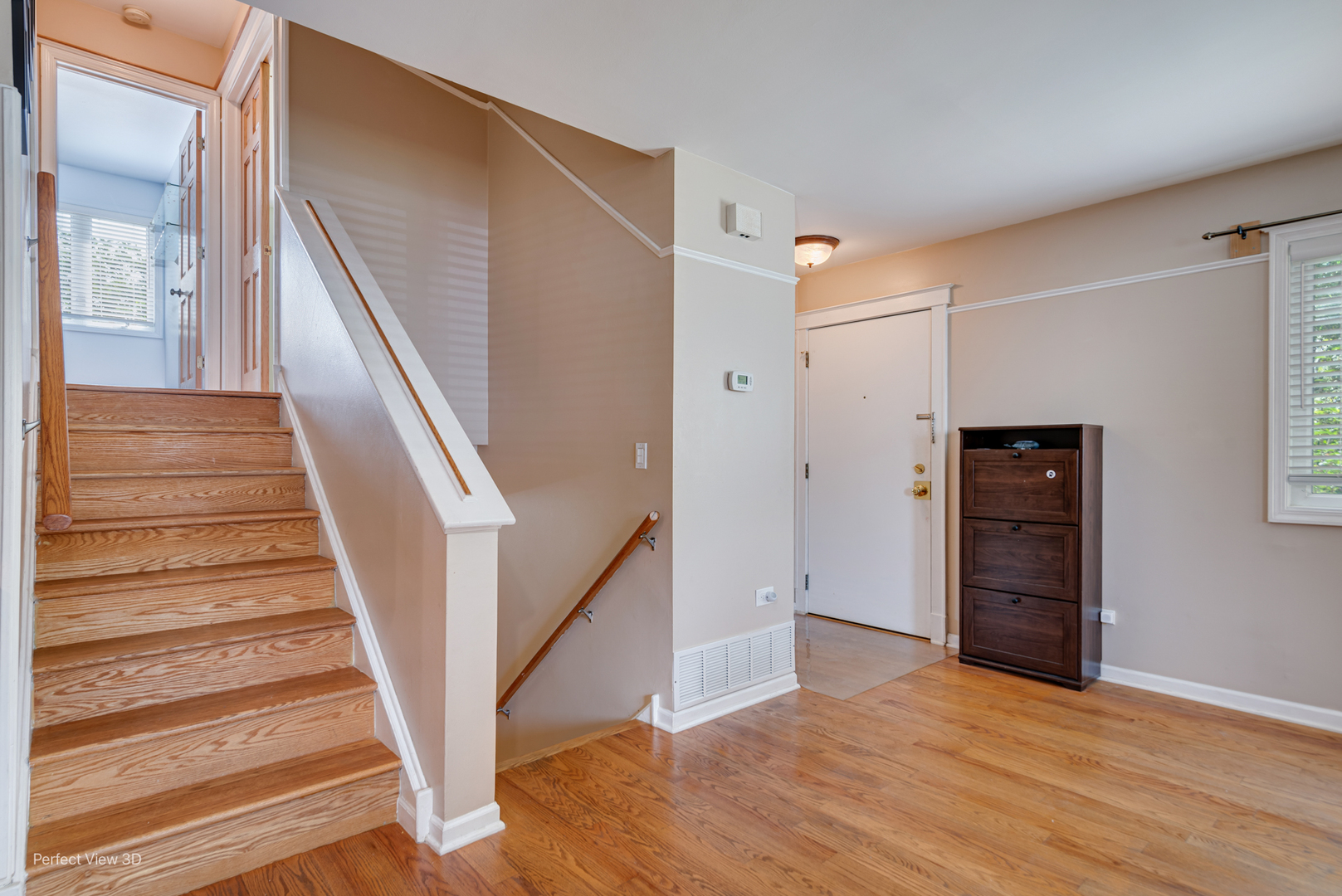 532 Inverrary Lane Deerfield, IL 60015 - Photo 4 of 23 a view of a hallway with wooden floor and entryway