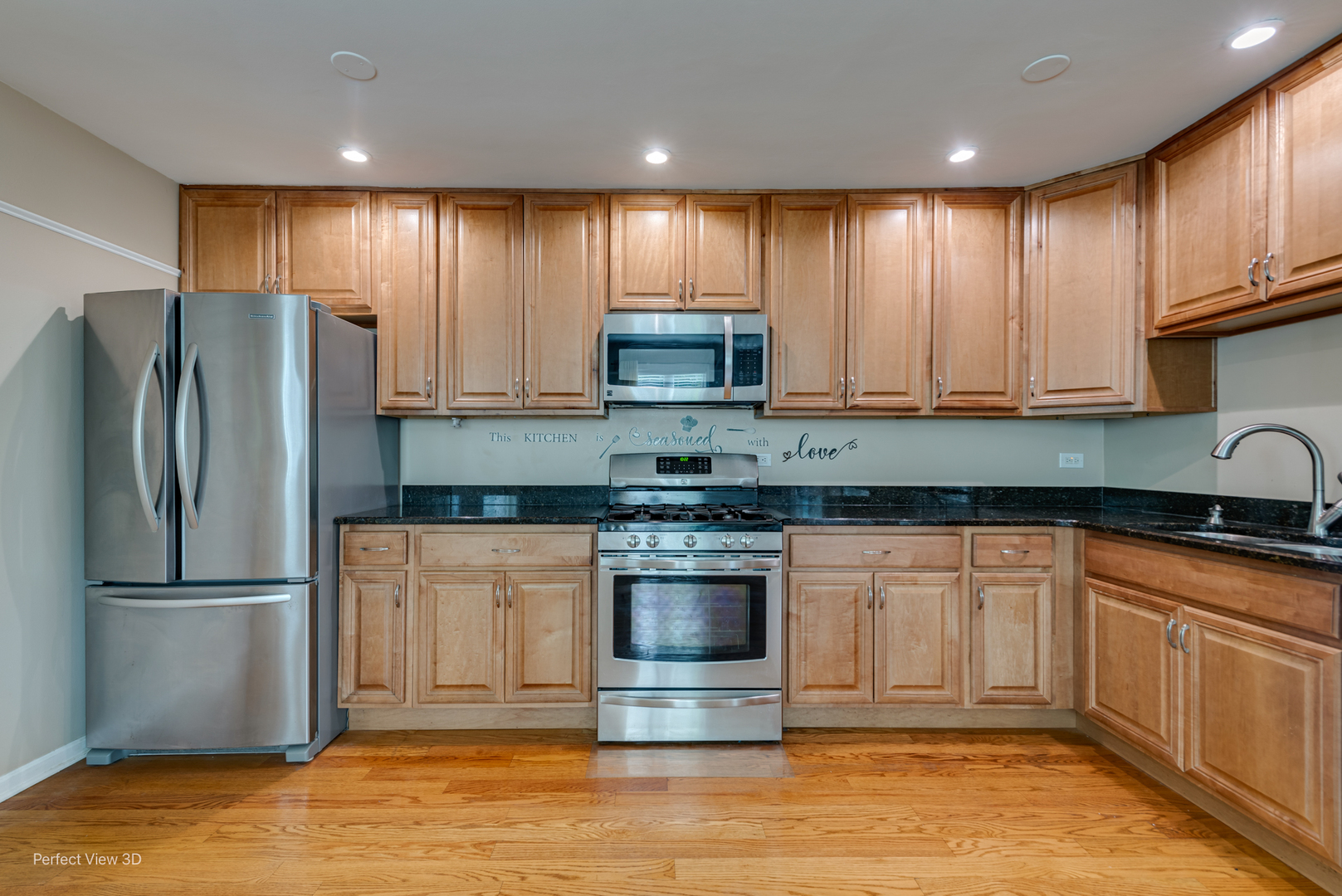 532 Inverrary Lane Deerfield, IL 60015 - Photo 5 of 23 a kitchen with stainless steel appliances granite countertop a stove a refrigerator and a microwave
