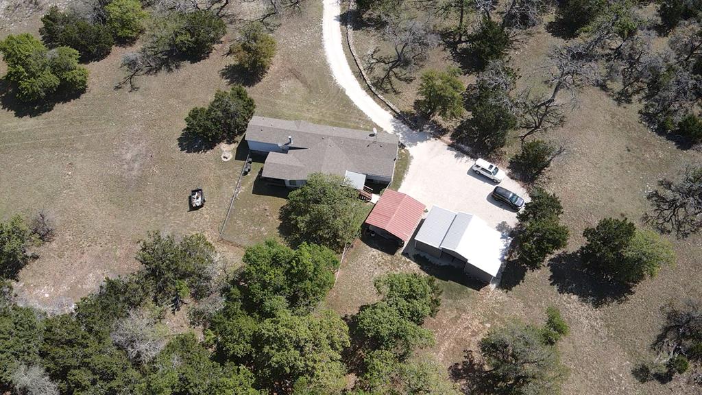 912 Alamo Road Fredericksburg, TX 78624 - Photo 20 of 21 an aerial view of a house with a yard