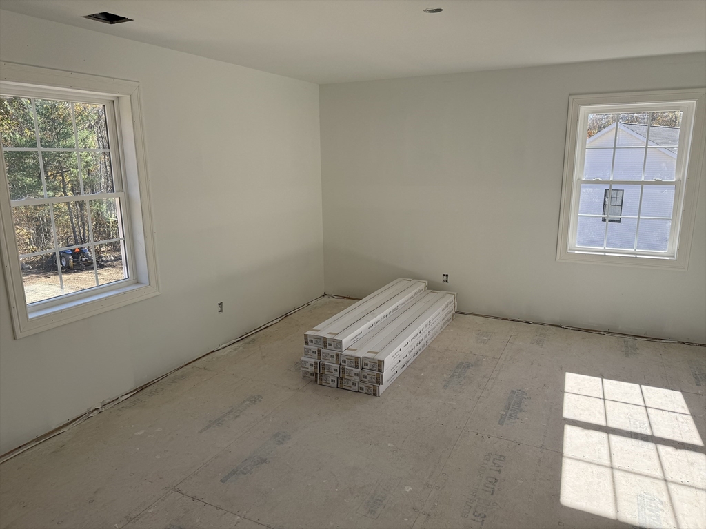 41 Deroche Circle Ludlow, MA 01056 - Photo 14 of 16 an empty room with windows