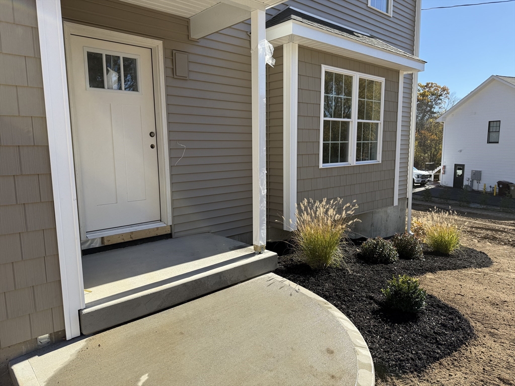 41 Deroche Circle Ludlow, MA 01056 - Photo 2 of 16 a view of a house with backyard and garden