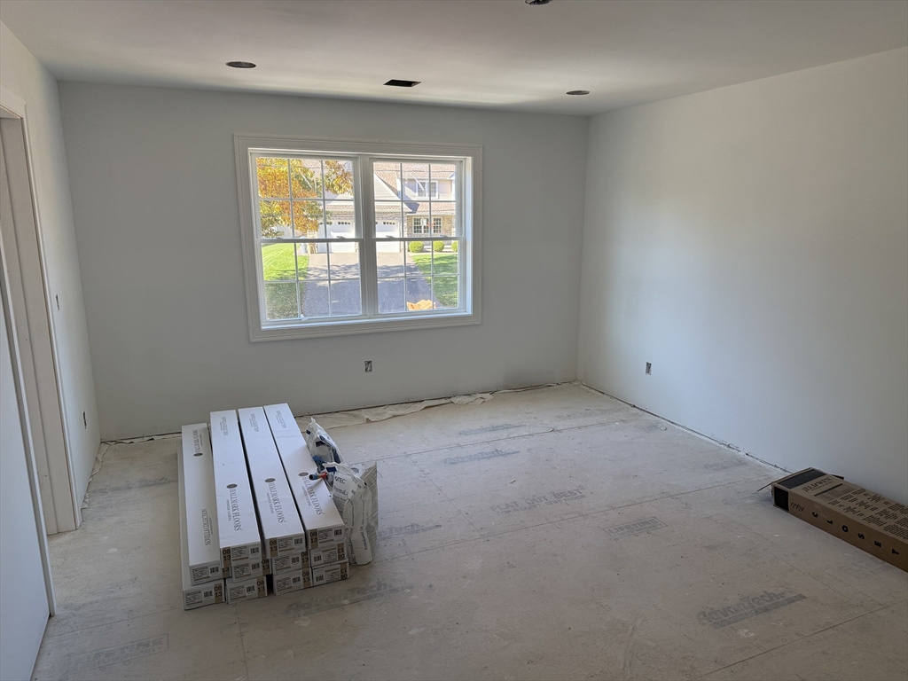 41 Deroche Circle Ludlow, MA 01056 - Photo 10 of 16 an empty room with a window