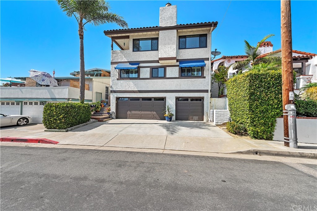 312 Avenida Granada, Unit A San Clemente, CA 92672 - Photo 2 of 25 front view of a house with a yard