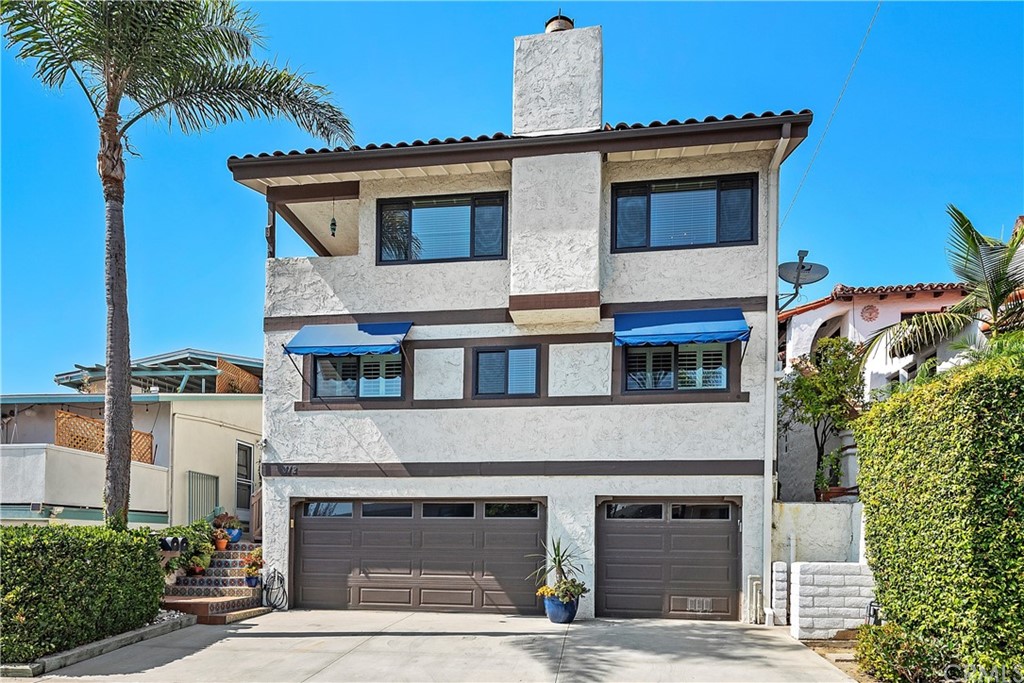 312 Avenida Granada, Unit A San Clemente, CA 92672 - Photo 23 of 25 a front view of a house with plants