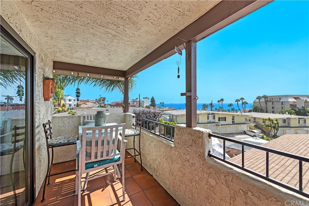 312 Avenida Granada, Unit A San Clemente, CA 92672 - Photo 4 of 25 a view of a balcony with chairs